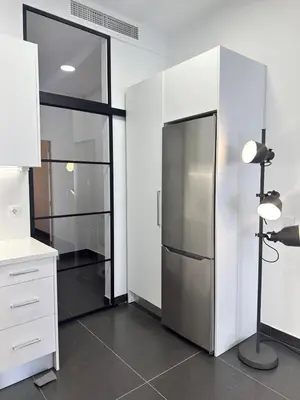 Una cocina o zona de cocina en Marshall Suite