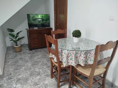 Una televisión o centro de entretenimiento en Casa Lucía - Caminito del rey