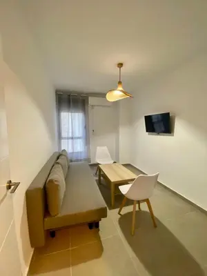 Una televisión o centro de entretenimiento en 9742 Apartamento Corte Inglés