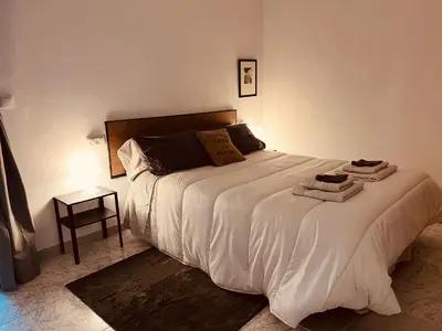 Cama o camas de una habitación en Apartamento Bajo Palio