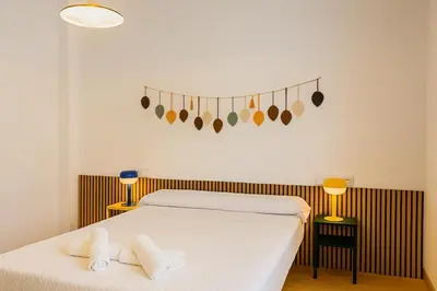 Cama o camas de una habitación en Sol y Olivos Apartamento céntrico en zona de aparcamiento gratuito