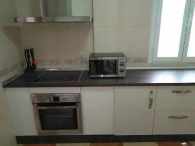 Una cocina o zona de cocina en Piso Calle Pelayo