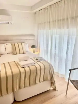 Cama o camas de una habitación en ISG Apartments Faustino 45-0