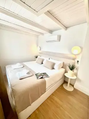 Cama o camas de una habitación en ISG Apartments Faustino 45-0