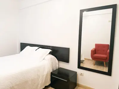 Cama o camas de una habitación en El balcón de la Luz