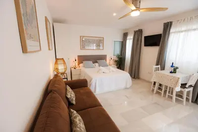 Cama o camas de una habitación en El ático de Osario 5 con terraza - Great location