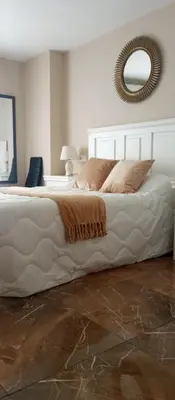 Cama o camas de una habitación en Apartamento el Arcángel