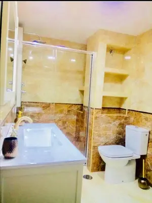 Un baño de Apartamento el Arcángel