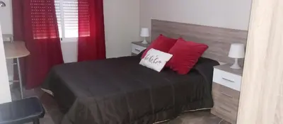 Cama o camas de una habitación en Apartamento el Arcángel