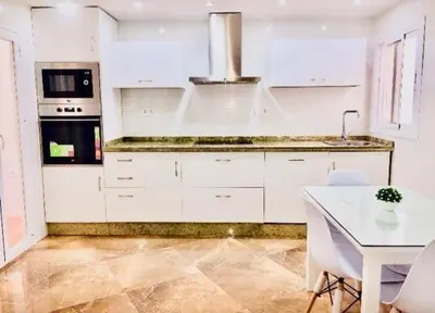 Una cocina o zona de cocina en Apartamento el Arcángel