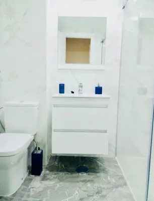 Un baño de Apartamento el Arcángel