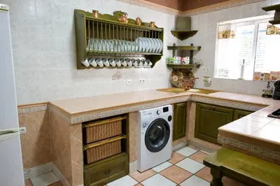 Una cocina o zona de cocina en Apartamento turísticos ilusiones 1