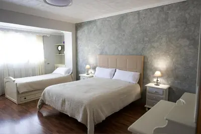 Cama o camas de una habitación en Apartamento turísticos ilusiones 1