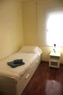 Cama o camas de una habitación en Turística Cervantes