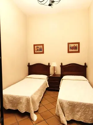 Cama o camas de una habitación en Posada del Potro Apartment