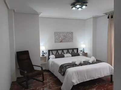 Cama o camas de una habitación en Plaza Ayuntamiento 2 habitaciones B&A