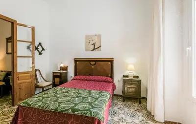 Cama o camas de una habitación en Amazing Home In El Pedroso With Wifi