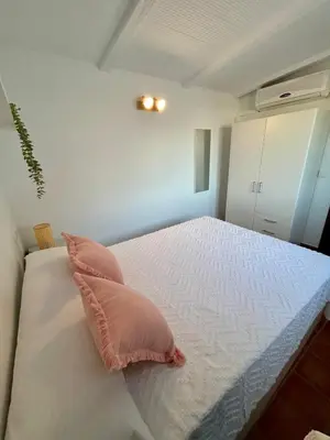 Cama o camas de una habitación en Casita Los Pinos