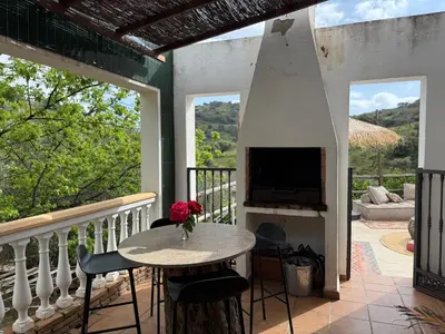 Un balcón o terraza de Authentic Luxury Villa in Oasis with Pool close to Malaga