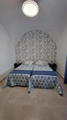 Cama o camas de una habitación en Casa Rural La Abuela Roja