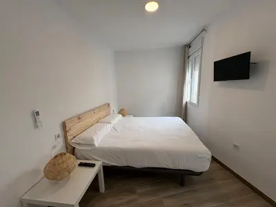 Una televisión o centro de entretenimiento en Ms31 Nuevo apartamento en centro