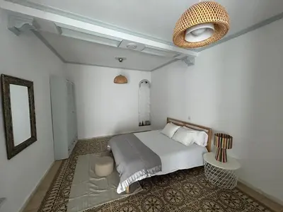 Cama o camas de una habitación en Un patio en La Alameda