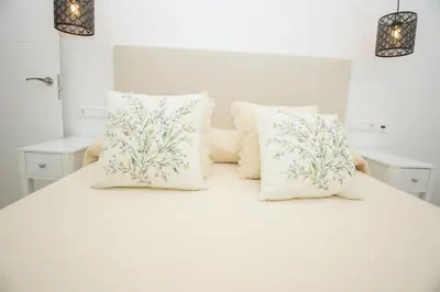Cama o camas de una habitación en El Templete Suite 2
