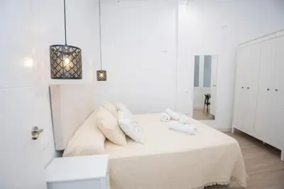 Cama o camas de una habitación en El Templete Suite 2