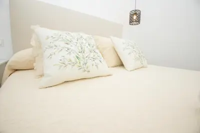 Cama o camas de una habitación en El Templete Suite 2