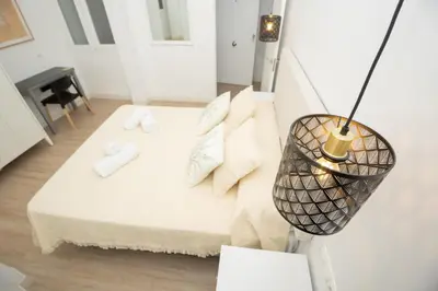 Cama o camas de una habitación en El Templete Suite 2
