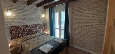 Cama o camas de una habitación en Apartmento 2 dormitorios - Centro Sevilla - Puerta Osario