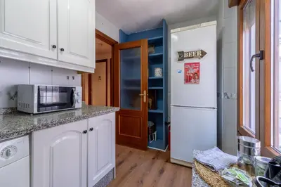 Una cocina o zona de cocina en Apartamento con Parking El Patio de La Muralla