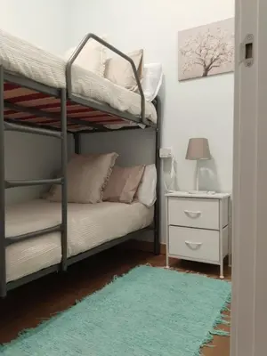 Cama o camas de una habitación en Casco Antiguo Patio de Feria