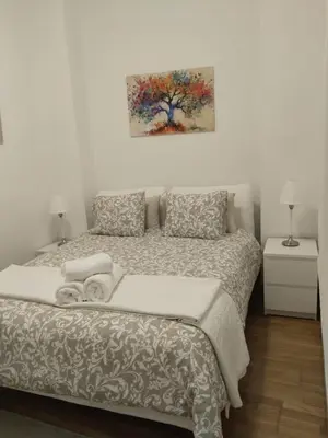 Cama o camas de una habitación en Casco Antiguo Patio de Feria