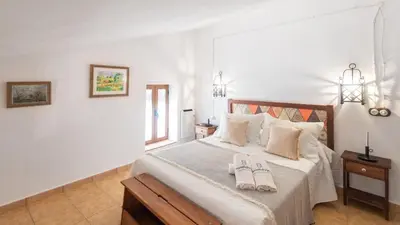 Cama o camas de una habitación en Cortijo Casablanca Villanueva de la Concepción by Ruralidays