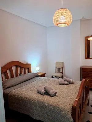 Cama o camas de una habitación en Apartamento N IV La Carolina Jaén