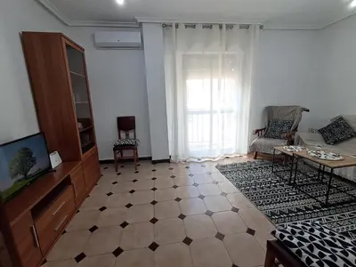 Una televisión o centro de entretenimiento en Apartamento N IV La Carolina Jaén