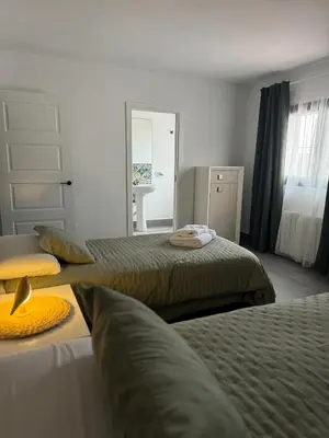 Cama o camas de una habitación en El Tilo - Alojamiento para grupos