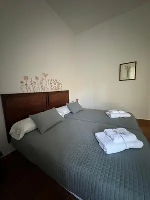 Cama o camas de una habitación en El Tilo - Alojamiento para grupos