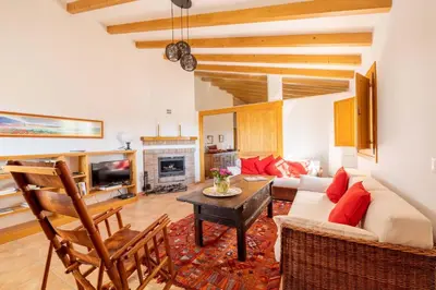 Zona de estar de Casa Gino by Rosas Cantares