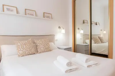 Cama o camas de una habitación en Alohamundi Dueñas