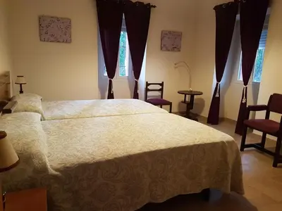 Cama o camas de una habitación en El Mirador del Abuelo