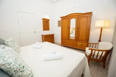 Cama o camas de una habitación en El Templete Suite 1