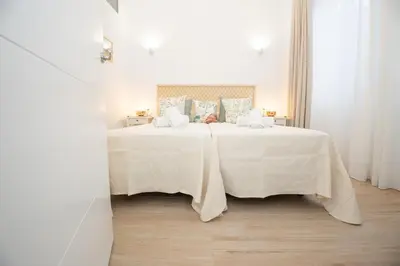 Cama o camas de una habitación en El Templete Suite 1