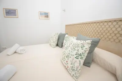 Cama o camas de una habitación en El Templete Suite 1