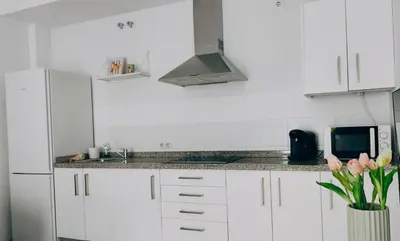 Una cocina o zona de cocina en Living Sevilla & Parking gratis