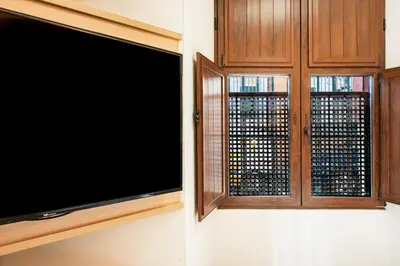 Una televisión o centro de entretenimiento en Alohamundi Alameda VI