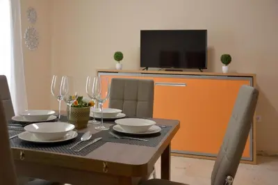 Una televisión o centro de entretenimiento en CASA PATIO LAS PALMERAs 3 y 4