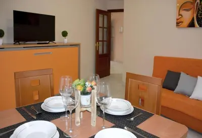 Una televisión o centro de entretenimiento en CASA PATIO LAS PALMERAs 5 y 6