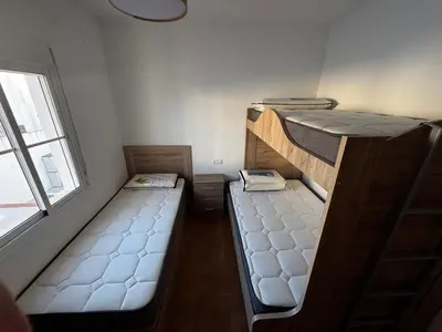 Cama o camas de una habitación en Casa Rural Castillo de Alanis